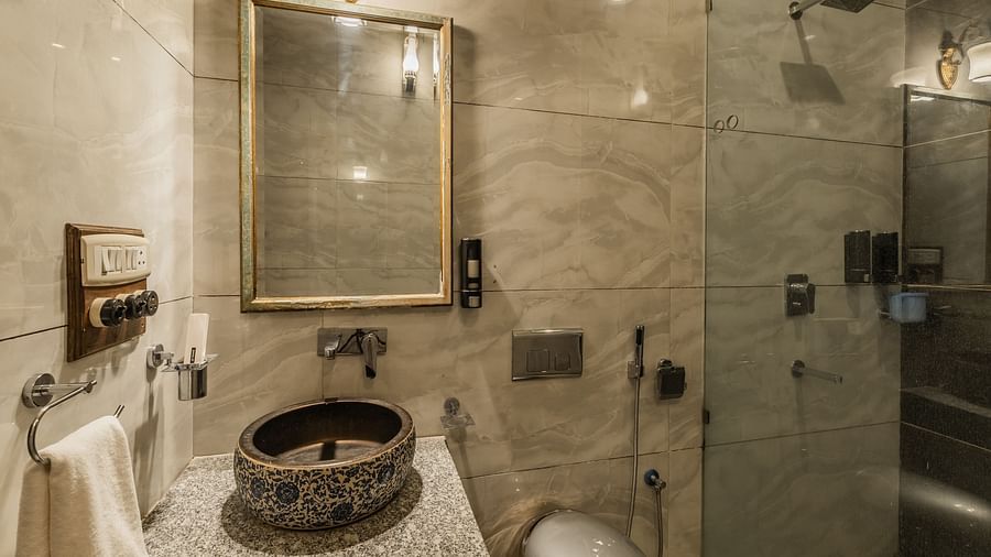 an image of a washroom with yellow lights illuminating.